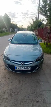 samochody osobowe Opel Astra cena 17900 przebieg: 203000, rok produkcji 2012 z Zgierz